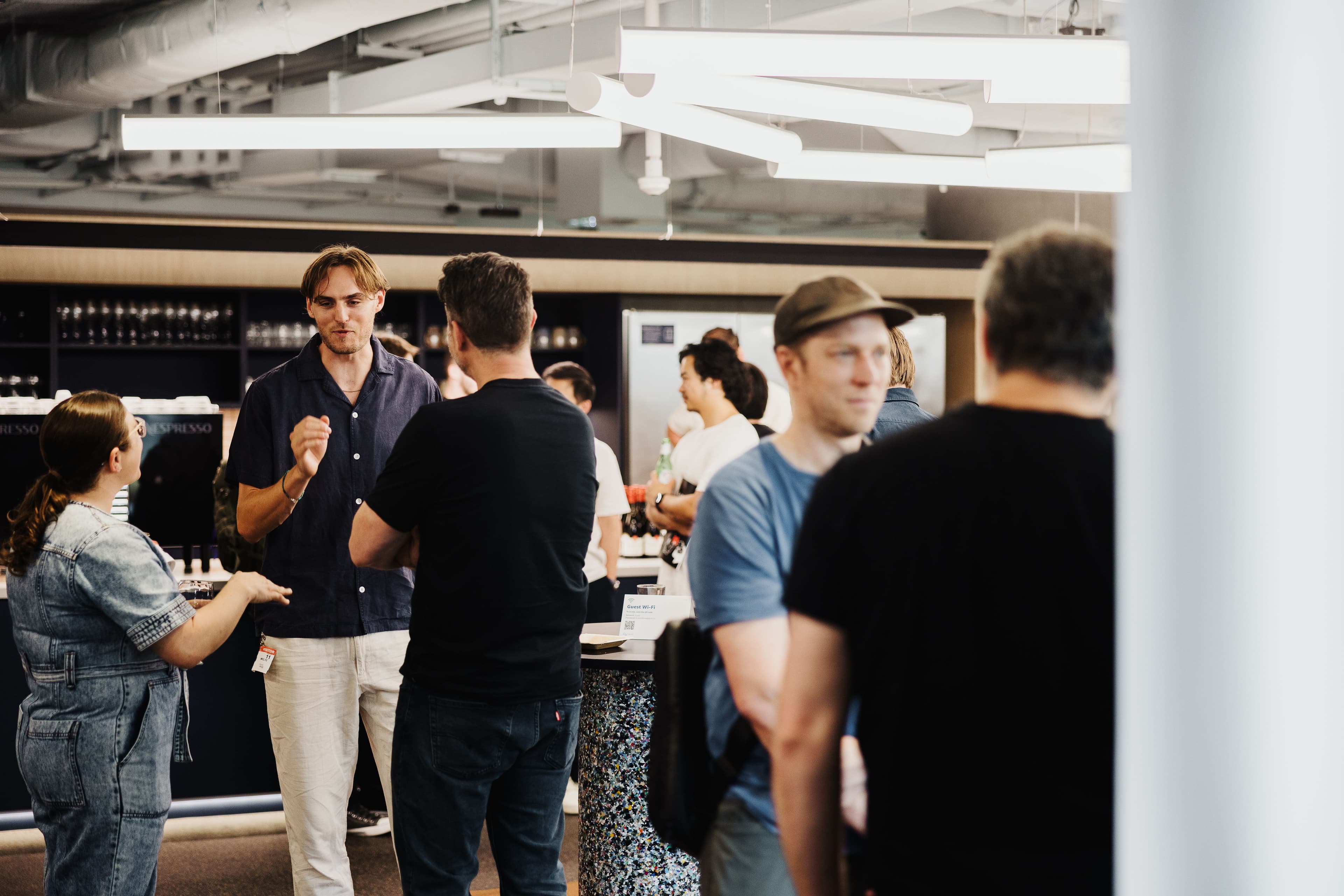 People networking at Compose event.